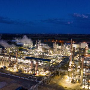 Illuminated petroleum refinery and processing infrastructure at night